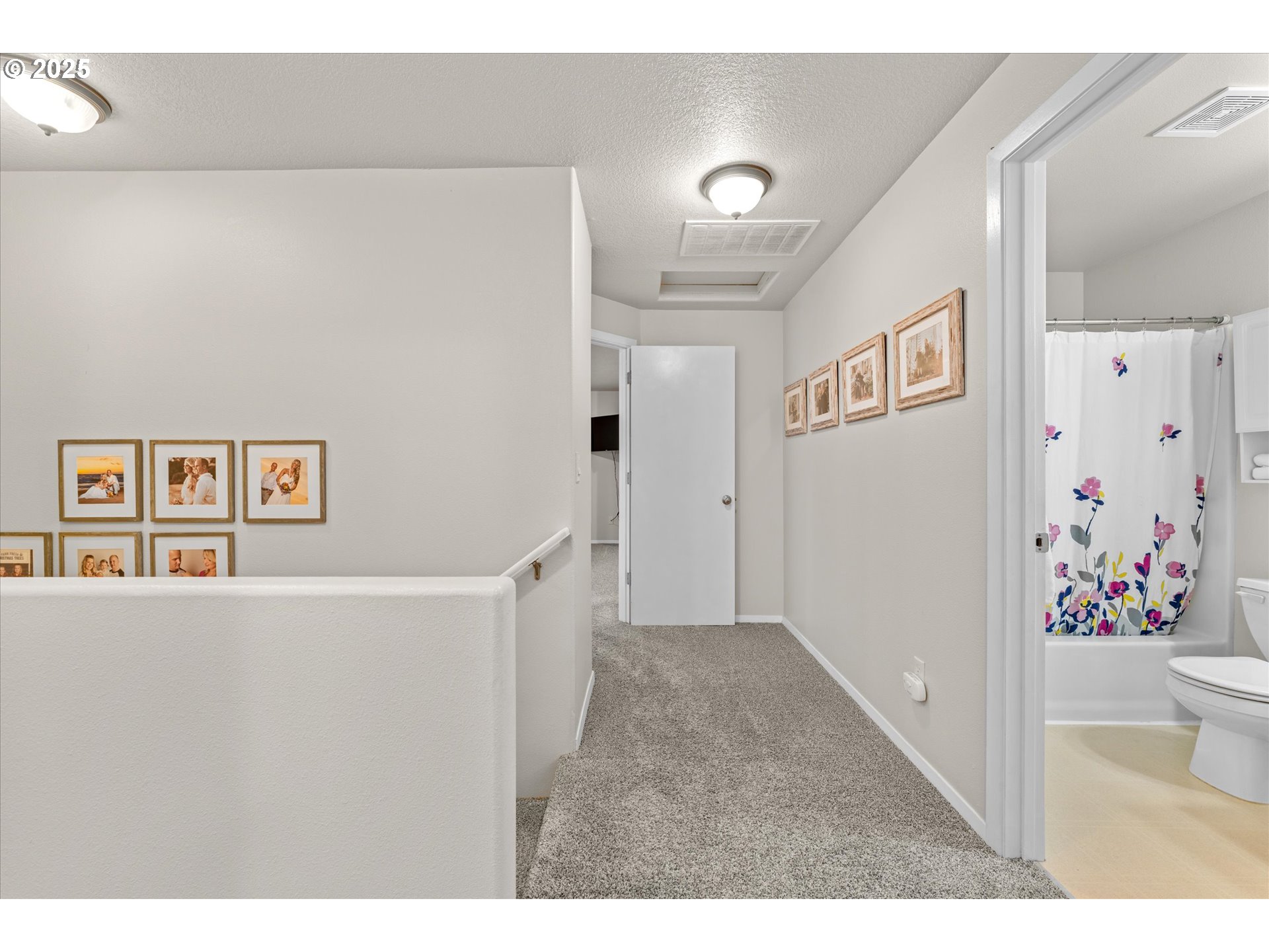 3019 Brooke Street Forest Grove, OR 97116 - Photo 20 of 34 a view of a hallway with kitchen and wooden floor