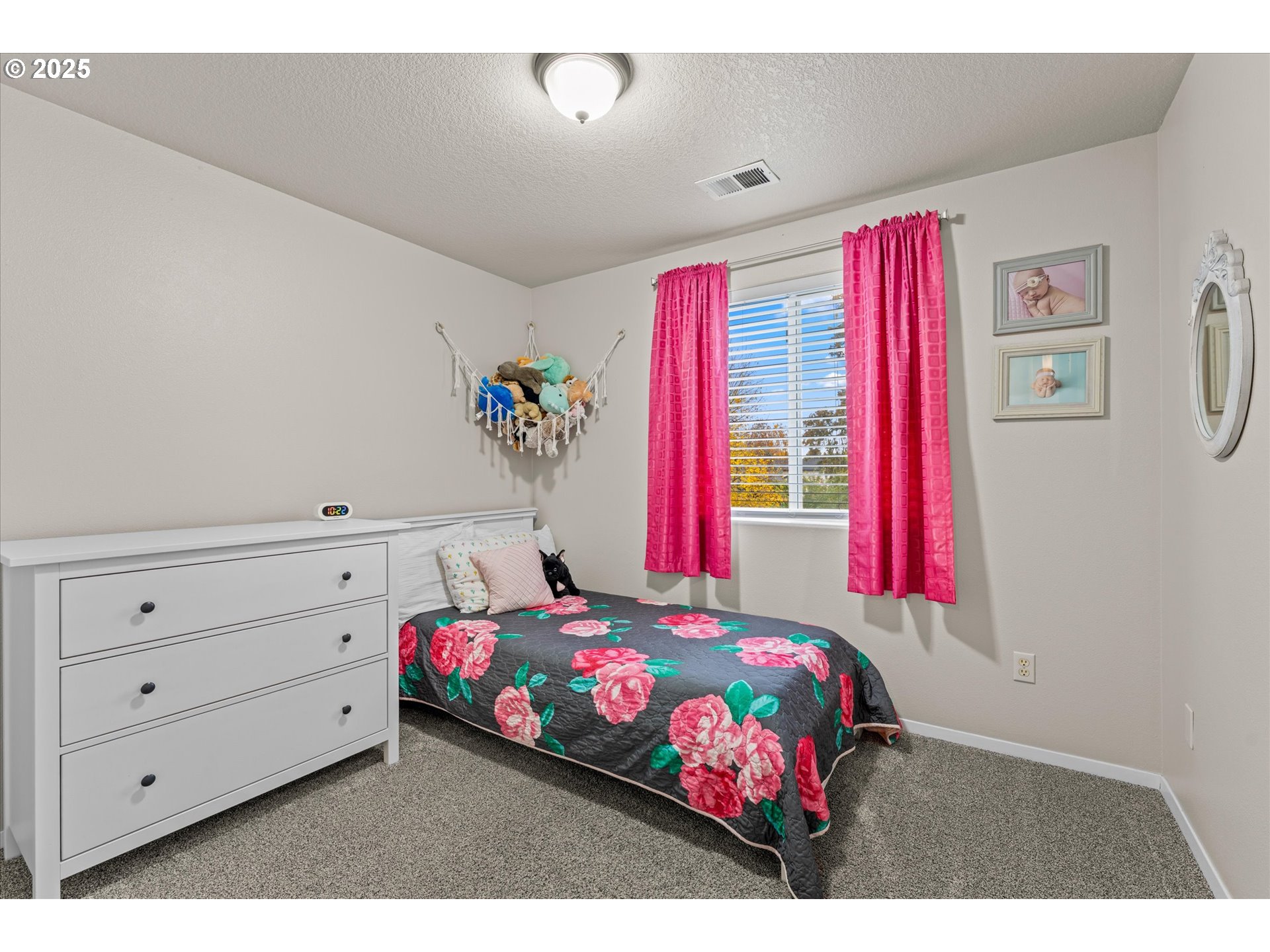 3019 Brooke Street Forest Grove, OR 97116 - Photo 21 of 34 a bedroom with a bed dresser and a window