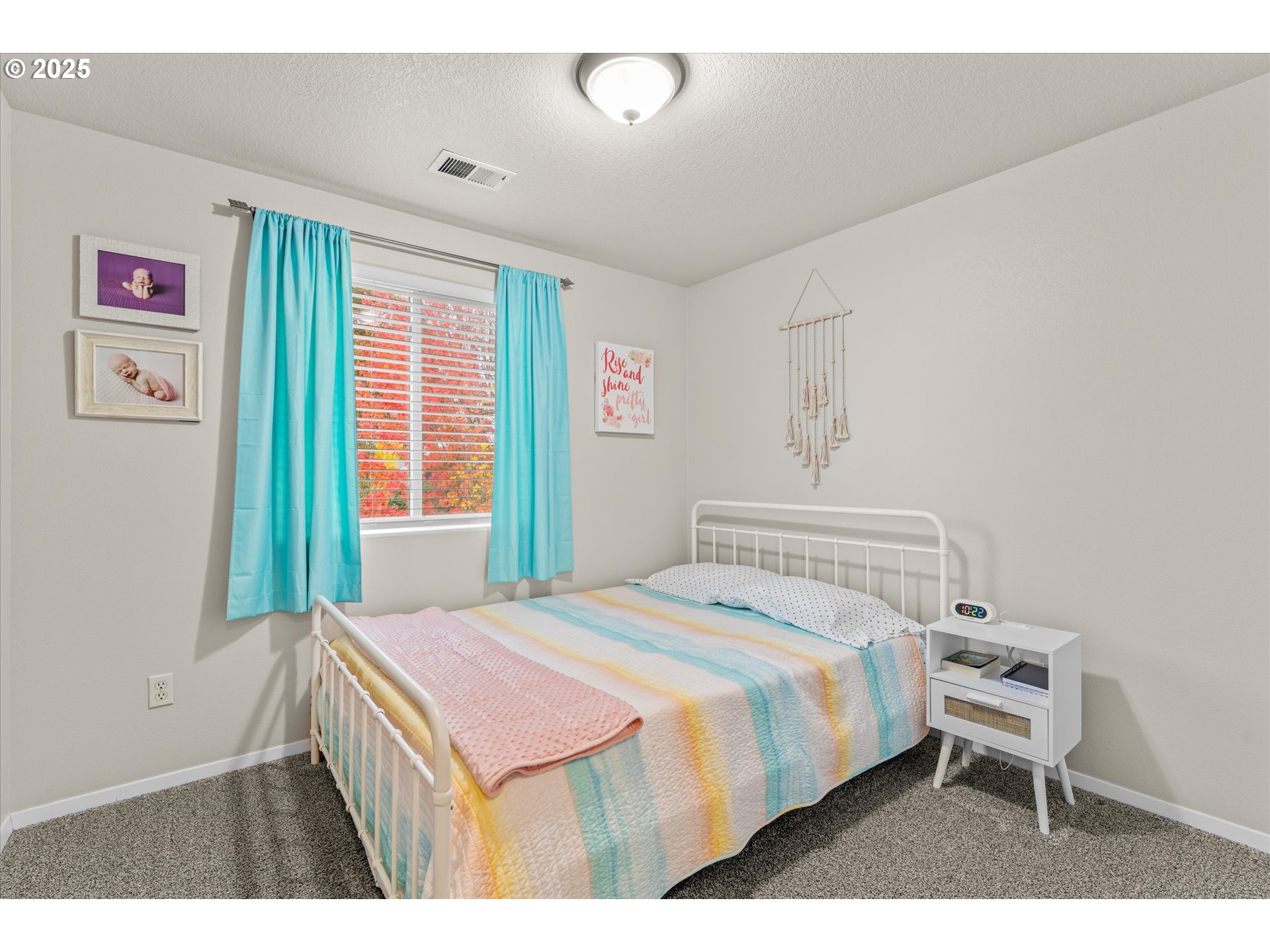 3019 Brooke Street Forest Grove, OR 97116 - Photo 22 of 34 a bedroom with a bed and a window