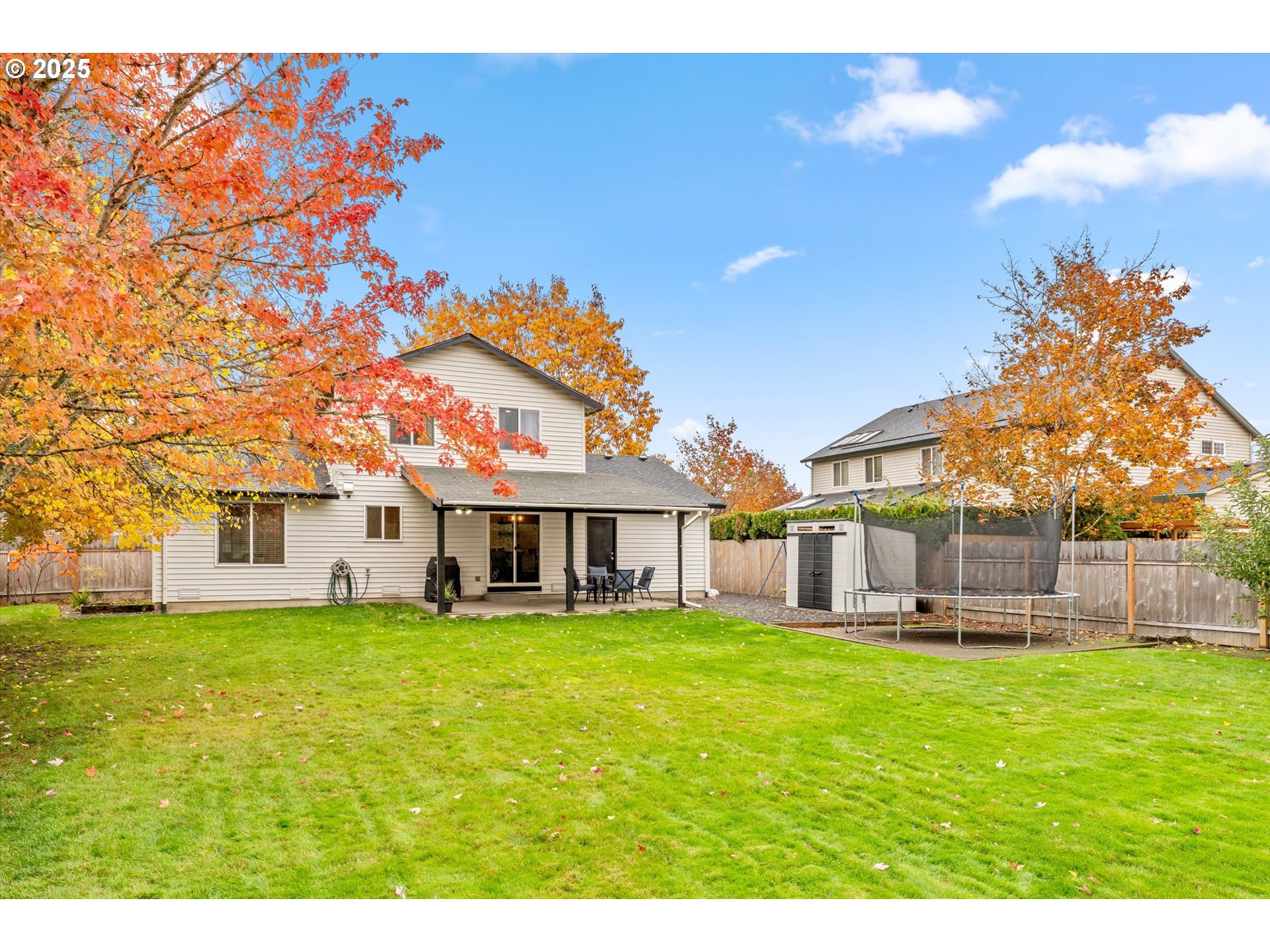3019 Brooke Street Forest Grove, OR 97116 - Photo 26 of 34 a view of a house with a big yard and palm trees
