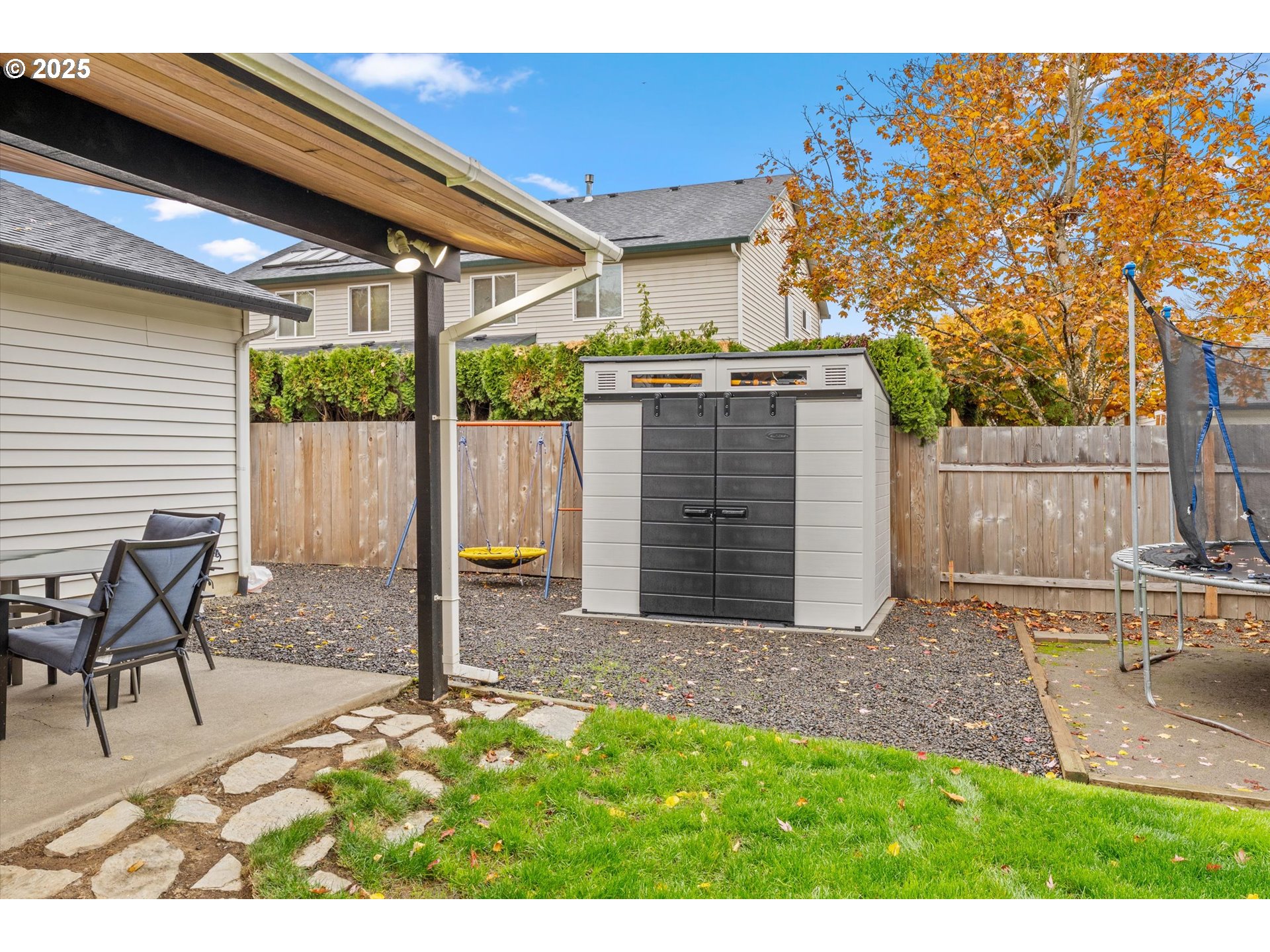 3019 Brooke Street Forest Grove, OR 97116 - Photo 27 of 34 a backyard of a house with table and chairs