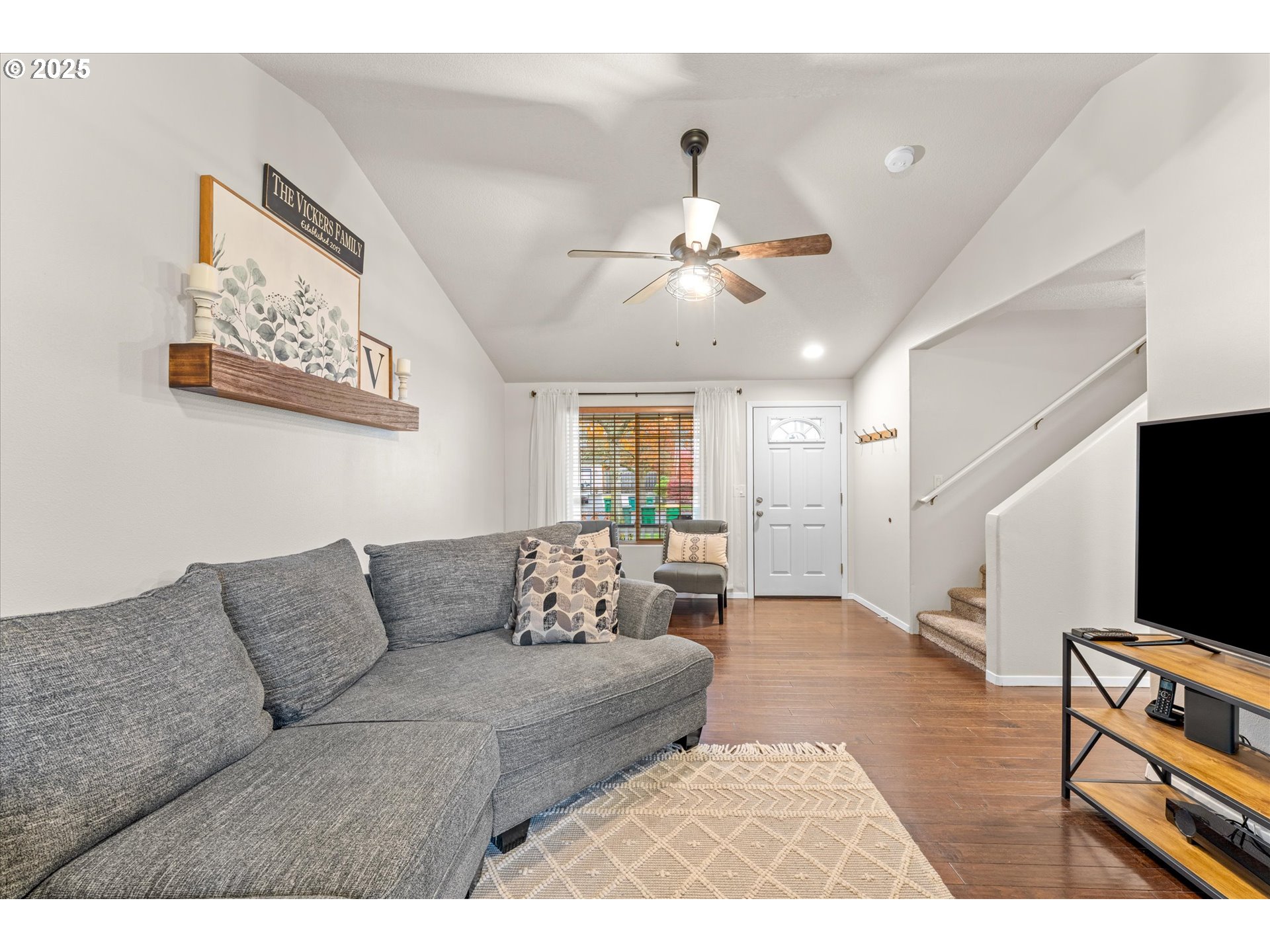 3019 Brooke Street Forest Grove, OR 97116 - Photo 8 of 34 a living room with furniture and a flat screen tv