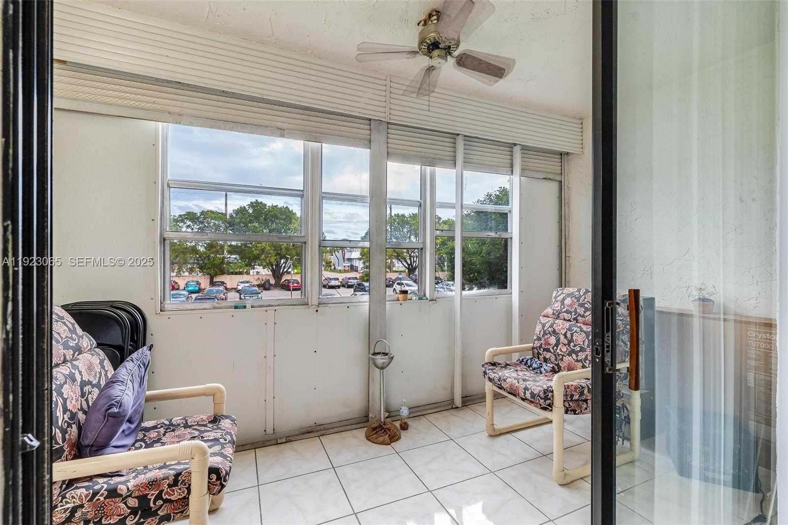 2840 Somerset Drive, Unit 207M Lauderdale Lakes, FL 33311 - Photo 11 of 25 a room with furniture and a window