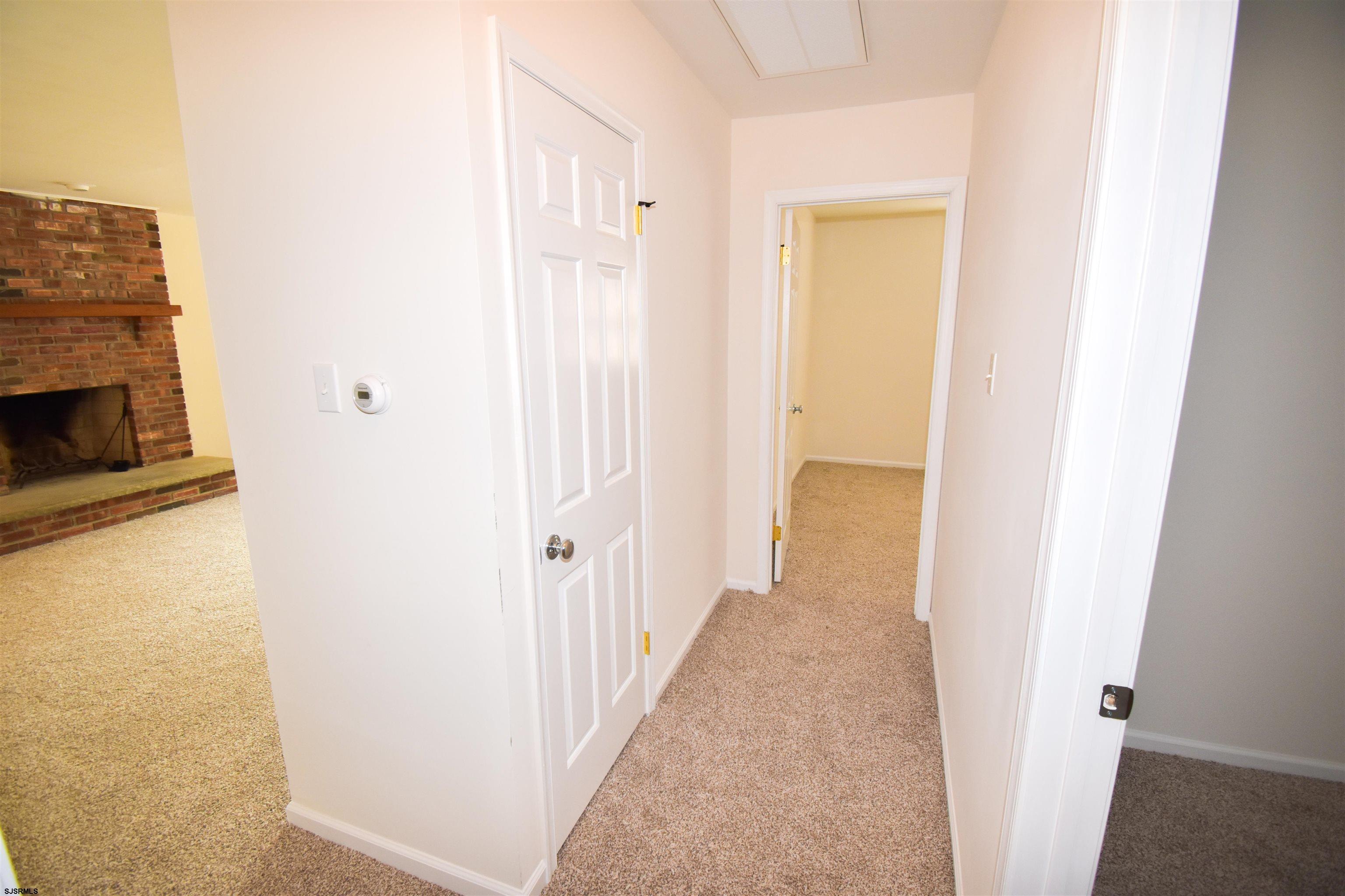600 Stagecoach Road Marmora, NJ 08223 - Photo 12 of 29 a view of a livingroom from a hallway