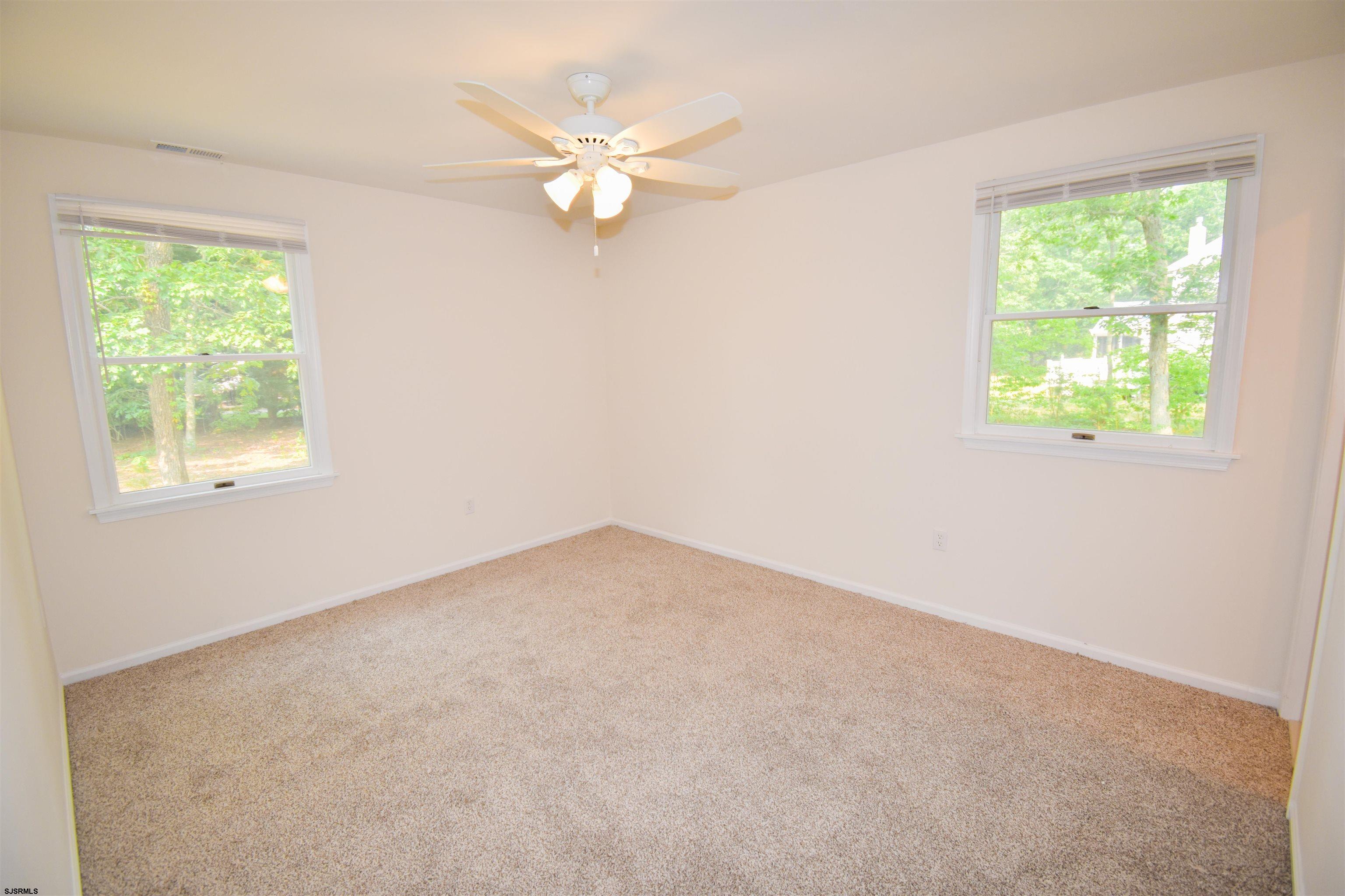 600 Stagecoach Road Marmora, NJ 08223 - Photo 17 of 29 an empty room with a window