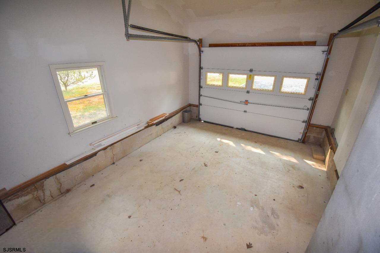 600 Stagecoach Road Marmora, NJ 08223 - Photo 20 of 29 a view of an empty room and window