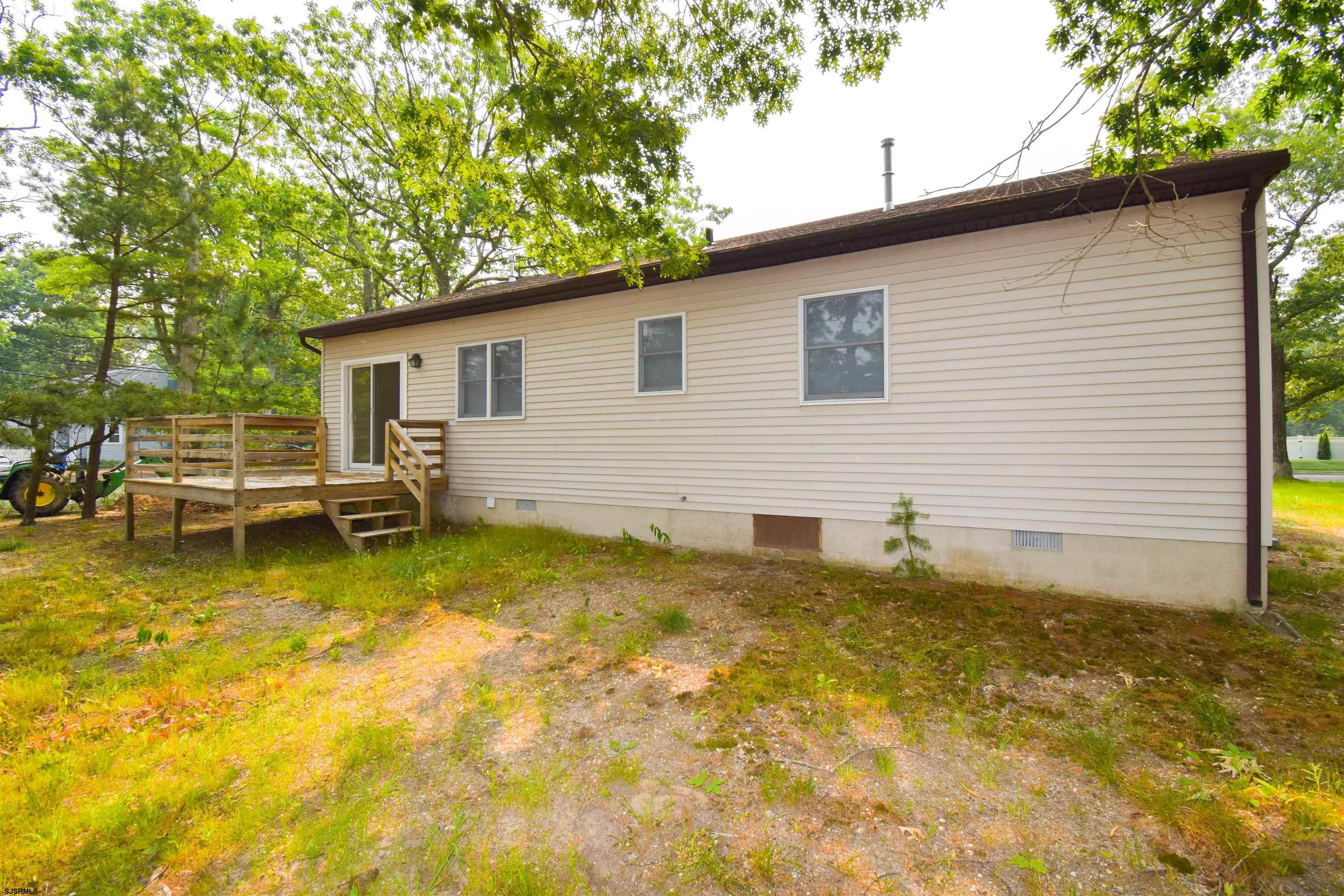 600 Stagecoach Road Marmora, NJ 08223 - Photo 23 of 29 a view of a backyard with swimming pool