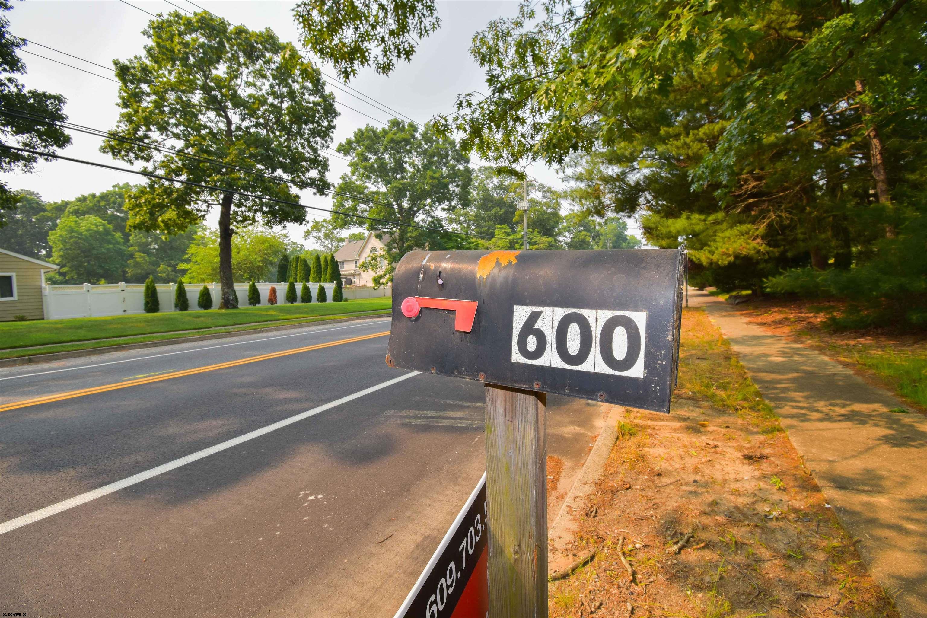 600 Stagecoach Road Marmora, NJ 08223 - Photo 29 of 29 a sign that is on the side of a road