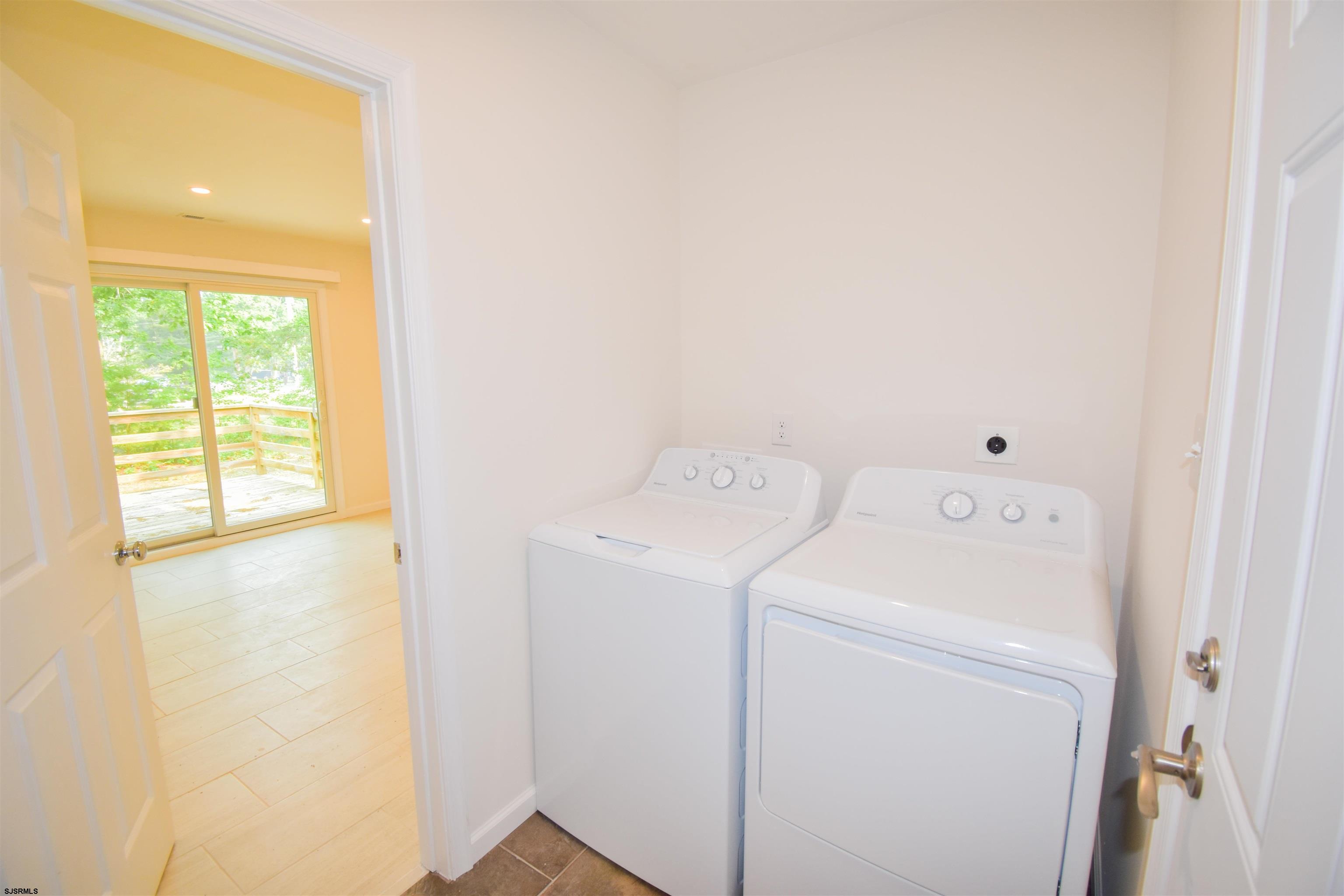 600 Stagecoach Road Marmora, NJ 08223 - Photo 10 of 29 a utility room with dryer and washer