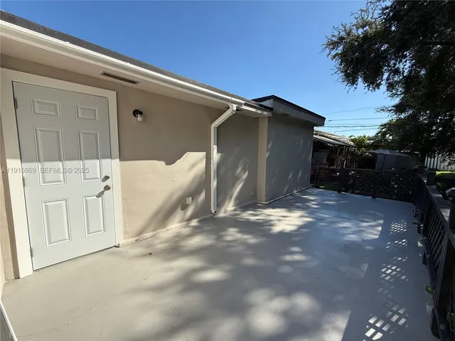 a view of a house with a yard and garage