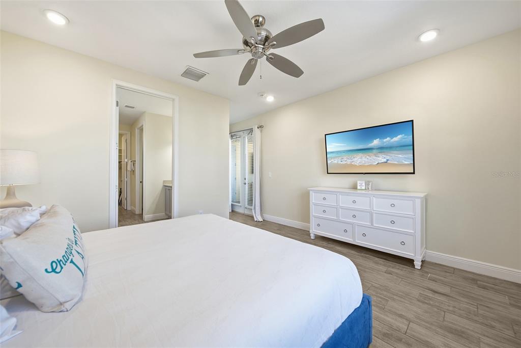 8017 Surf Street Kissimmee, FL 34747 - Photo 45 of 64 a bedroom with a bed and a dresser