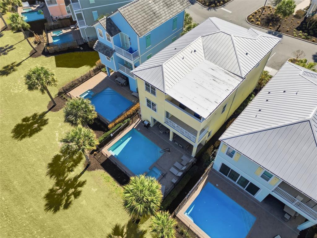 8017 Surf Street Kissimmee, FL 34747 - Photo 59 of 64 an aerial view of a house with a garden