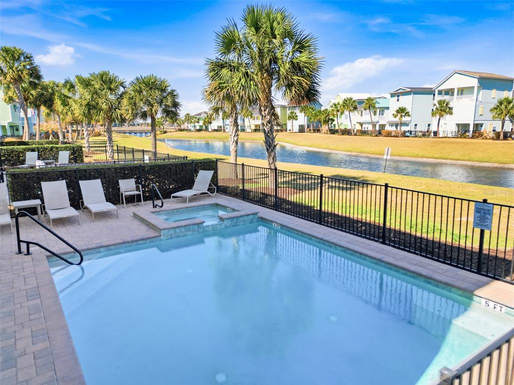 8017 Surf Street Kissimmee, FL 34747 - Photo 62 of 64 a view of swimming pool with outdoor seating and city view