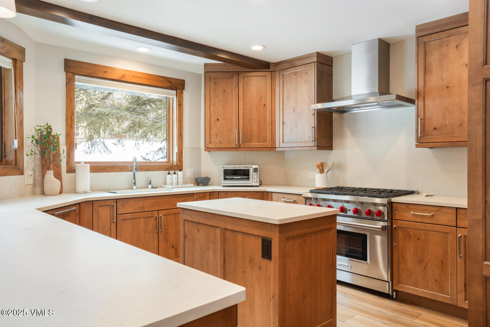 1670 Fallridge Place, Unit C11 Vail, CO 81657 - Photo 11 of 39 a kitchen with stainless steel appliances granite countertop a stove a sink and a microwave