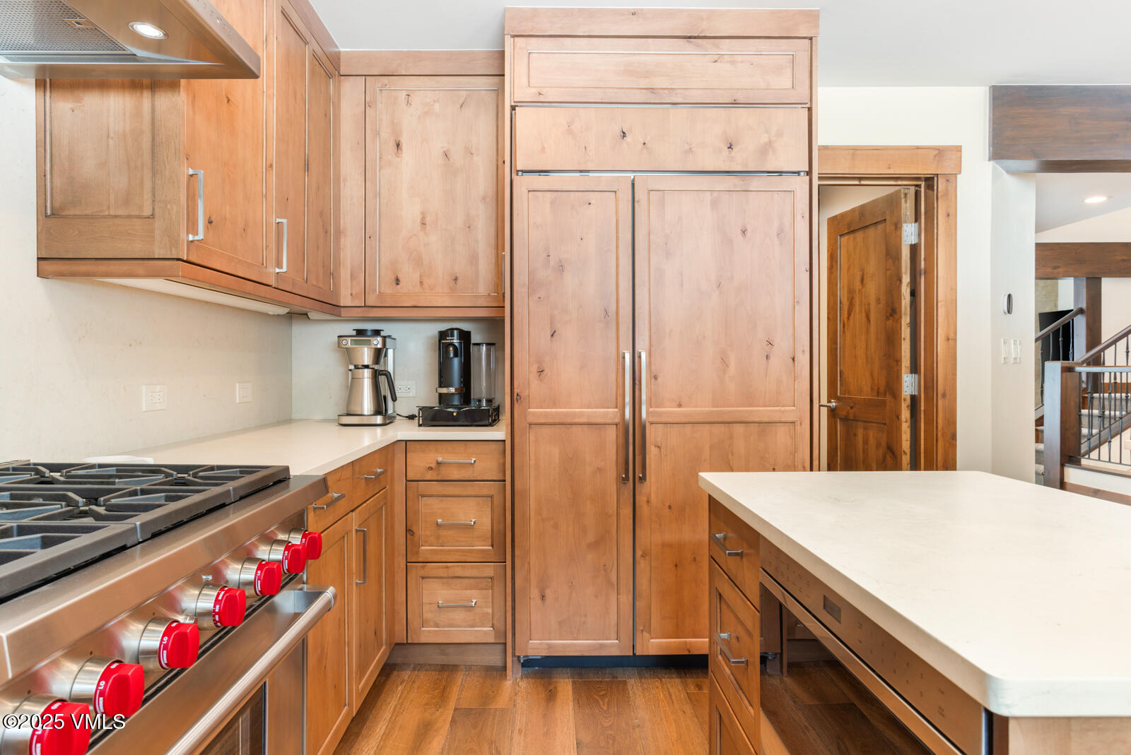 1670 Fallridge Place, Unit C11 Vail, CO 81657 - Photo 13 of 39 a kitchen with stainless steel appliances granite countertop a stove and a refrigerator