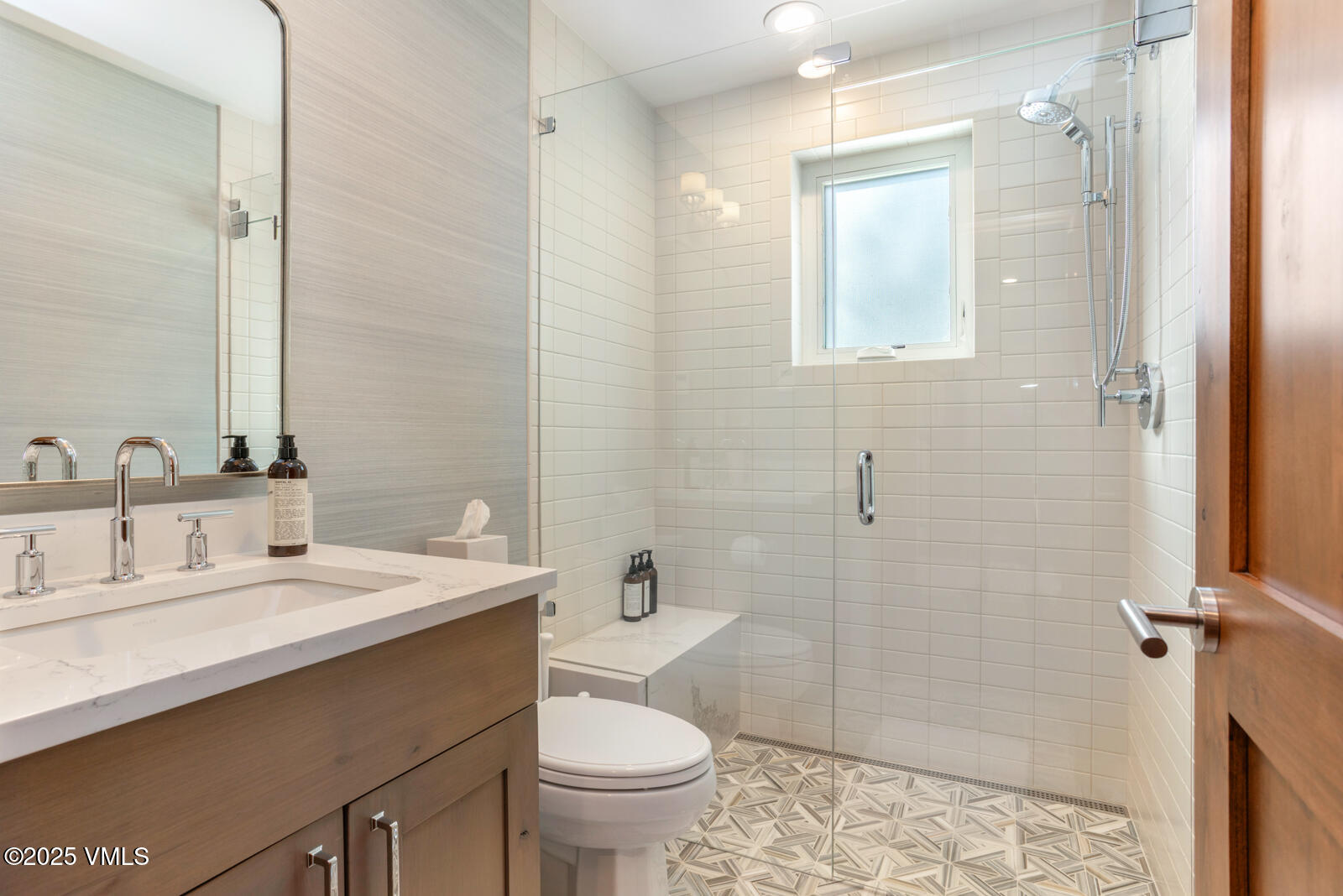 1670 Fallridge Place, Unit C11 Vail, CO 81657 - Photo 17 of 39 a bathroom with a sink toilet and shower