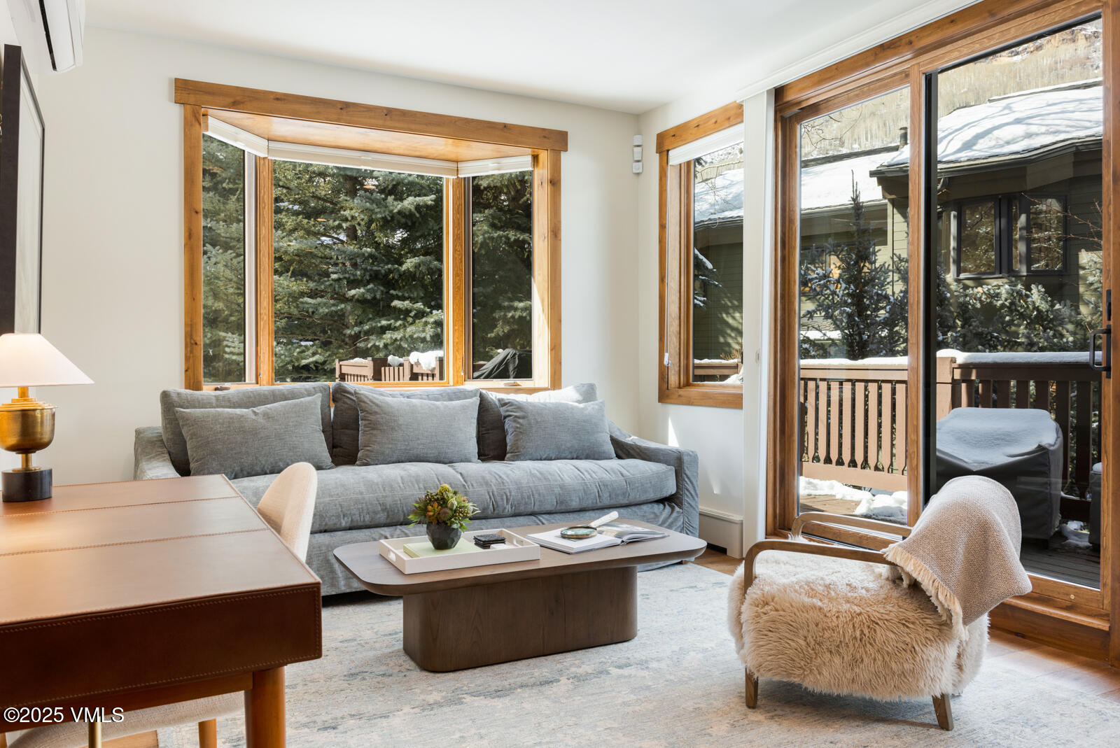 1670 Fallridge Place, Unit C11 Vail, CO 81657 - Photo 19 of 39 a living room with furniture and a large window