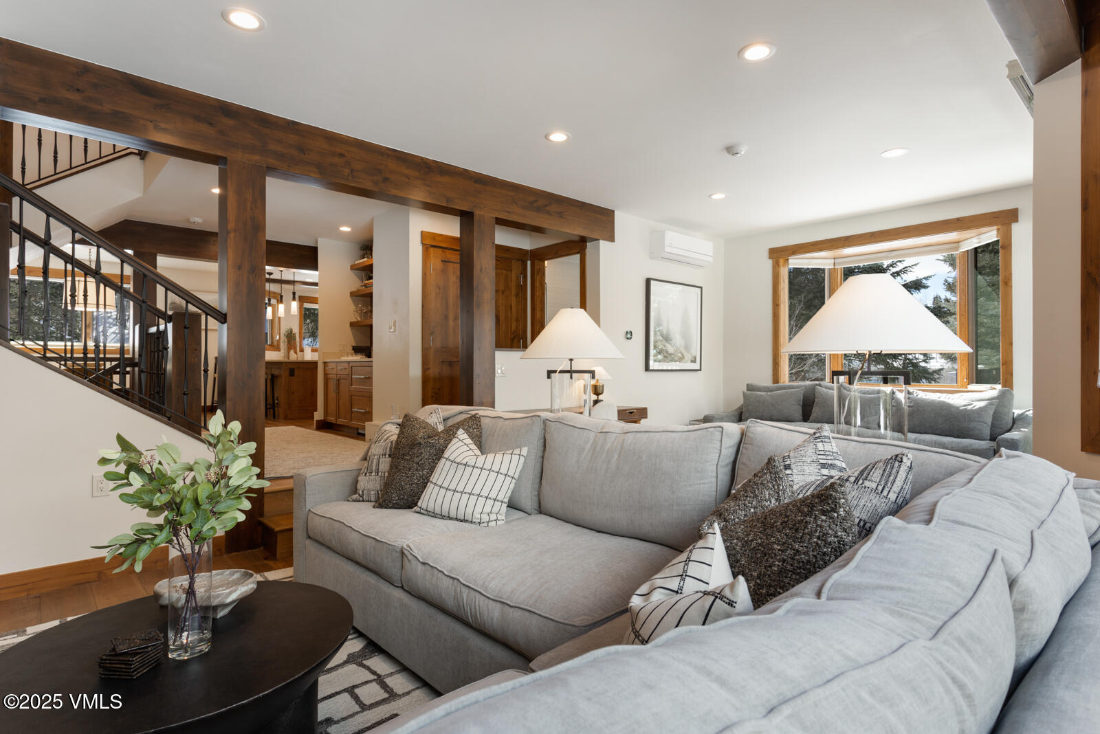 1670 Fallridge Place, Unit C11 Vail, CO 81657 - Photo 23 of 39 a living room with furniture and a large window