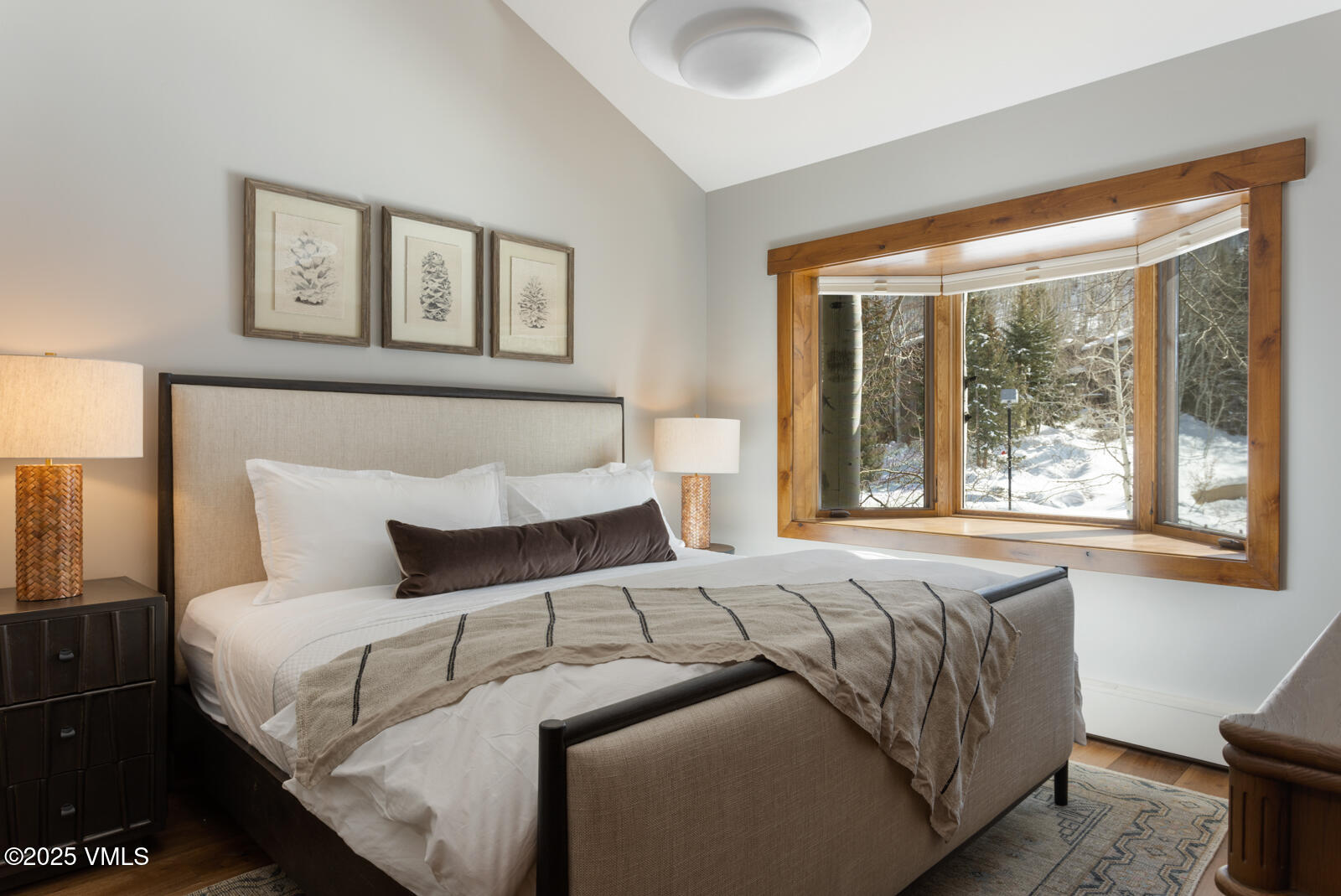 1670 Fallridge Place, Unit C11 Vail, CO 81657 - Photo 24 of 39 a bedroom with a large bed and a window