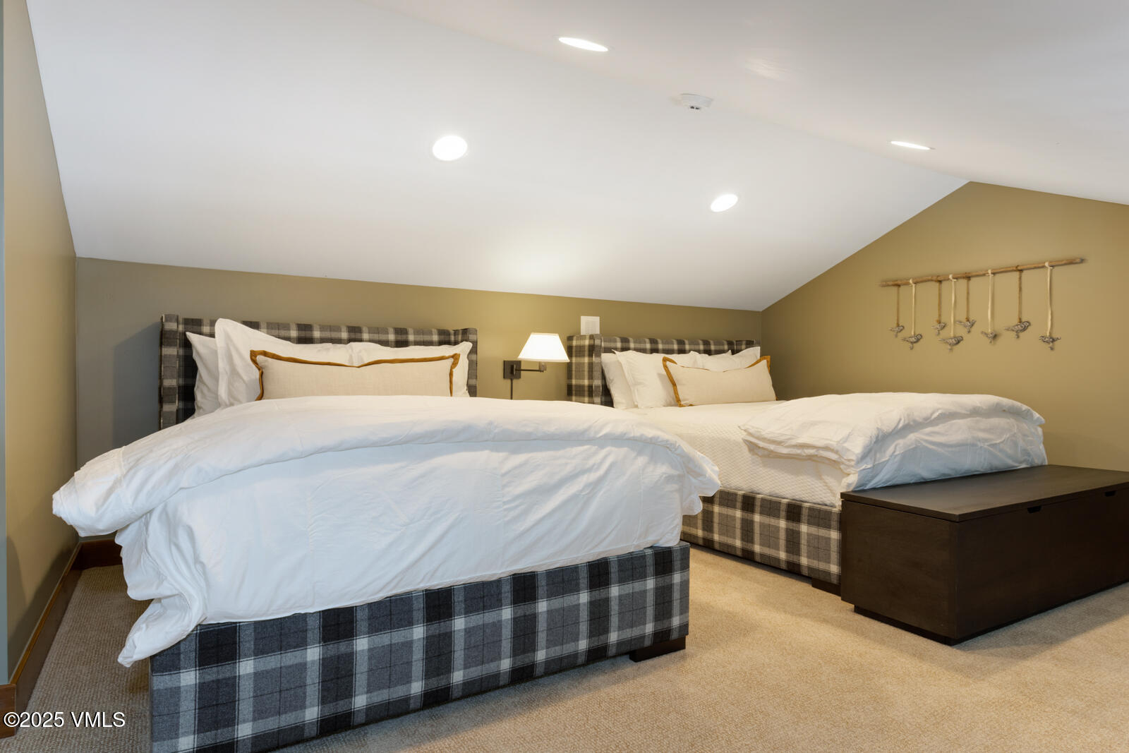 1670 Fallridge Place, Unit C11 Vail, CO 81657 - Photo 29 of 39 a bedroom with a bed and a night stand