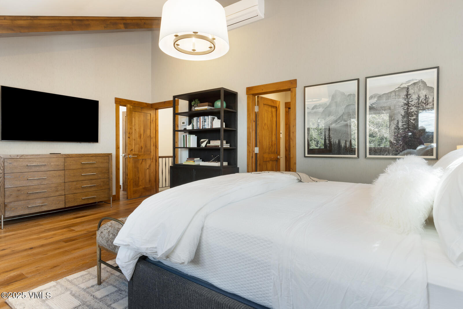 1670 Fallridge Place, Unit C11 Vail, CO 81657 - Photo 34 of 39 a bedroom with a bed and a flat screen tv