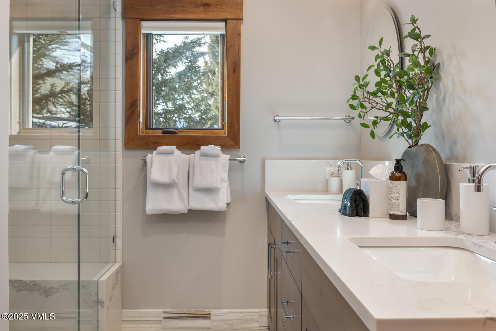1670 Fallridge Place, Unit C11 Vail, CO 81657 - Photo 36 of 39 a bathroom with a tub sink and mirror