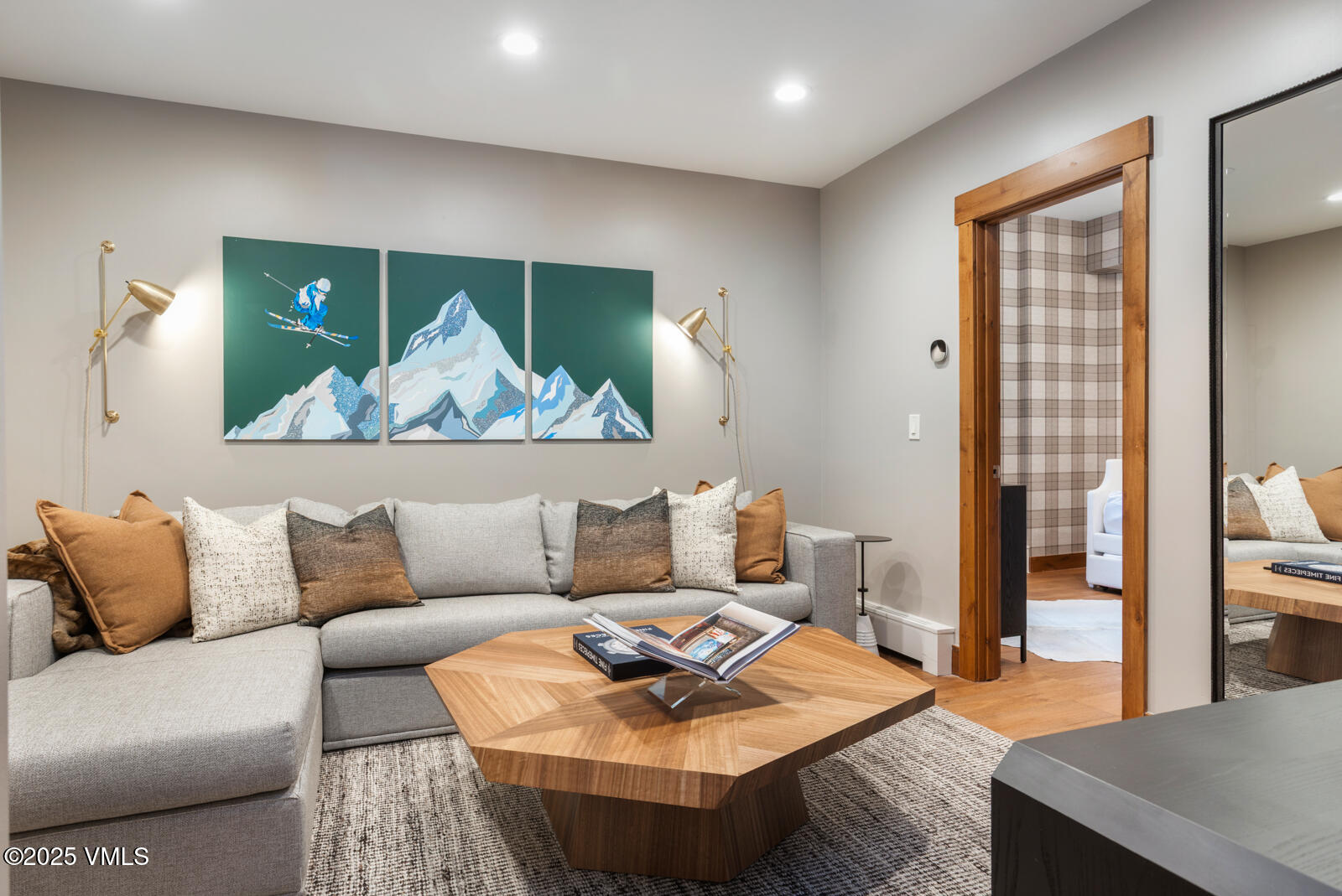 1670 Fallridge Place, Unit C11 Vail, CO 81657 - Photo 5 of 39 a living room with furniture and a painting