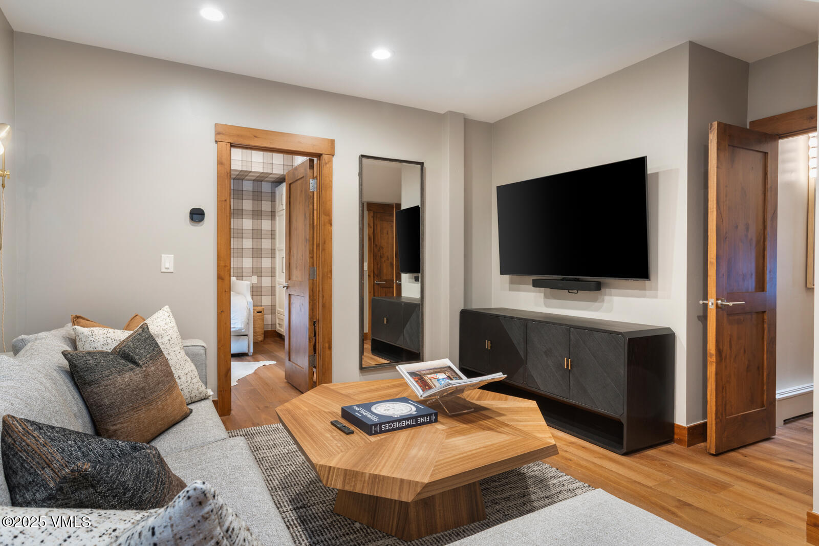 1670 Fallridge Place, Unit C11 Vail, CO 81657 - Photo 7 of 39 a living room with furniture and a flat screen tv