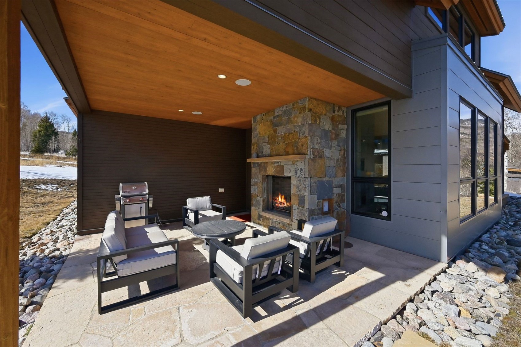 20 East Benjamin Point Silverthorne, CO 80498 - Photo 4 of 50 Coverd back porch with fireplace