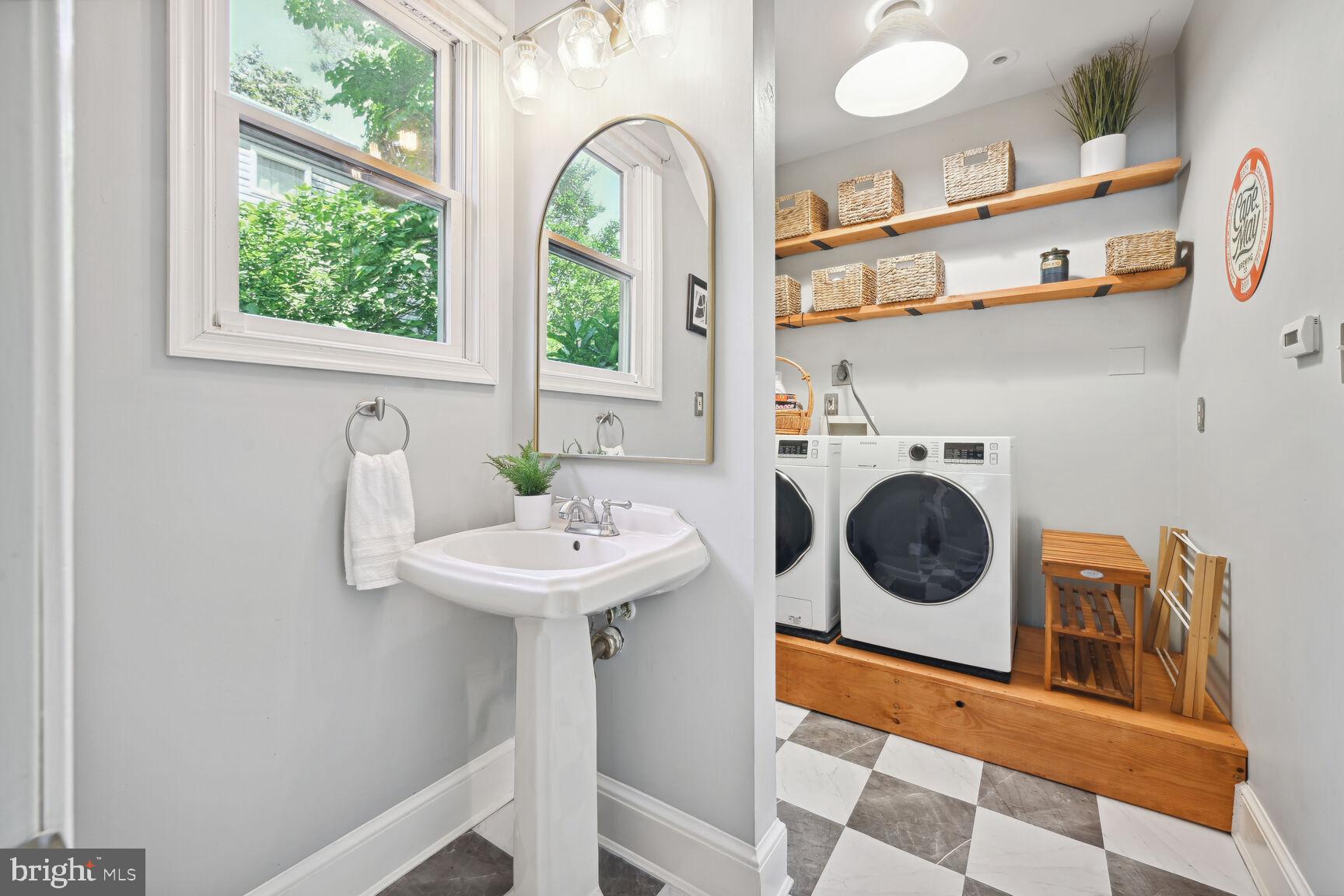 737 Thayer Avenue Silver Spring, MD 20910 - Photo 15 of 34 Half Bath with Laundry Area