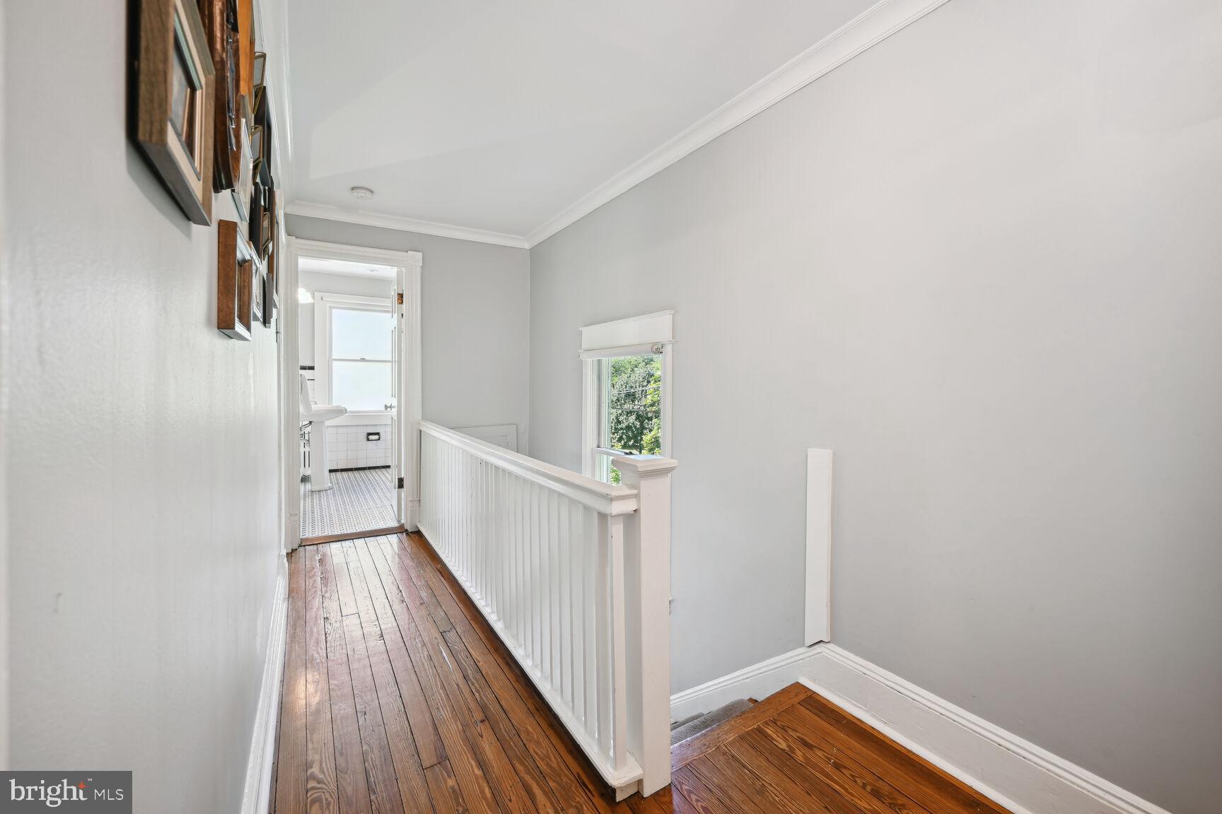 737 Thayer Avenue Silver Spring, MD 20910 - Photo 21 of 34 Hallway with Windows and Natural Light