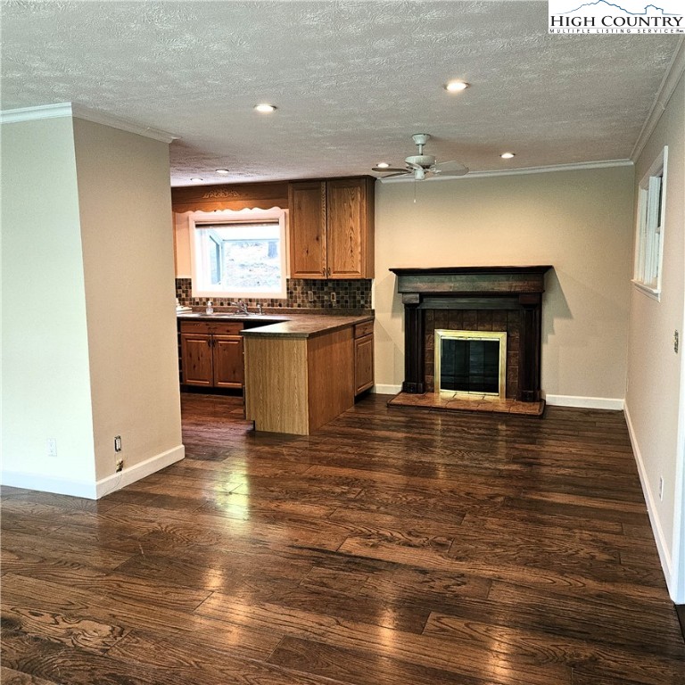 139 Charles Street Boone, NC 28607 - Photo 18 of 49 a view of open kitchen stove a sink and dishwasher with wooden floor