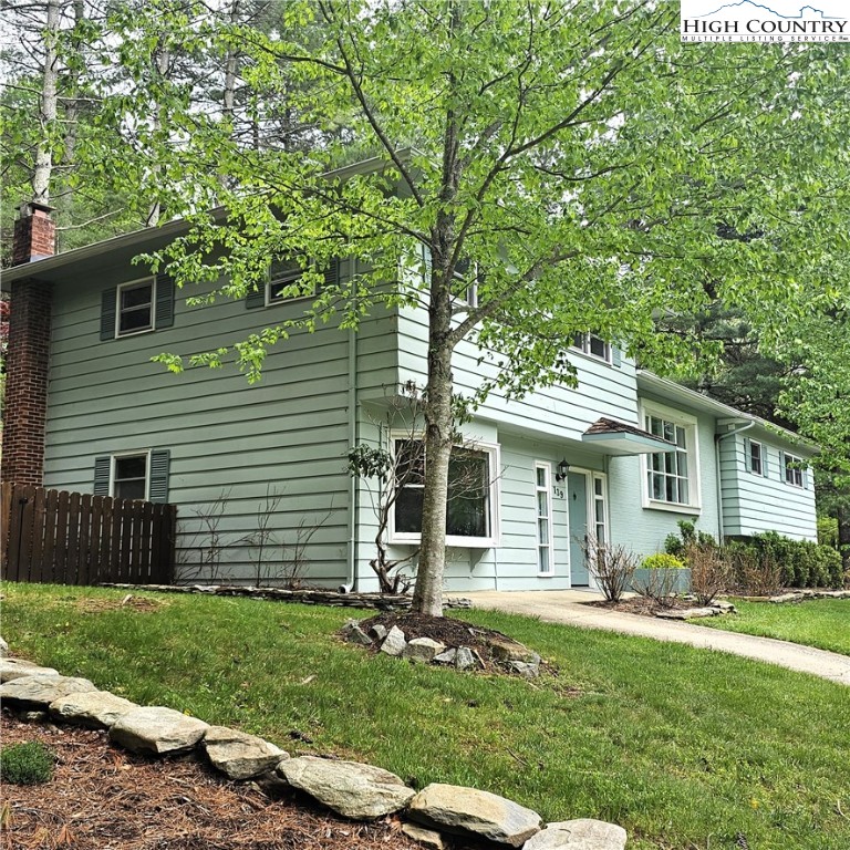 139 Charles Street Boone, NC 28607 - Photo 2 of 49 a front view of a house with a yard