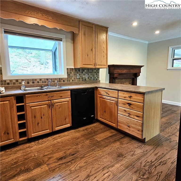 139 Charles Street Boone, NC 28607 - Photo 23 of 49 a kitchen with stainless steel appliances granite countertop a stove a sink and a microwave