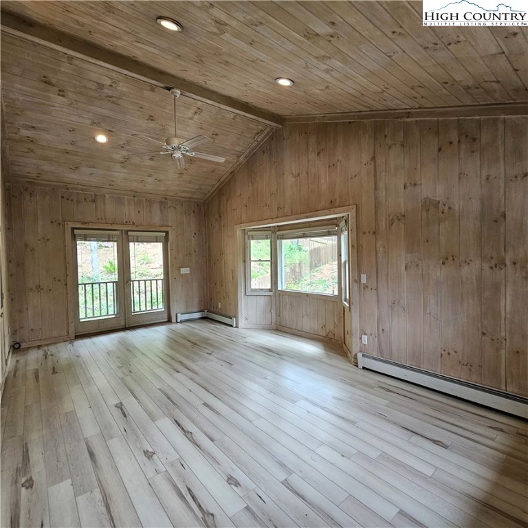 139 Charles Street Boone, NC 28607 - Photo 27 of 49 an empty room with wooden floor and windows