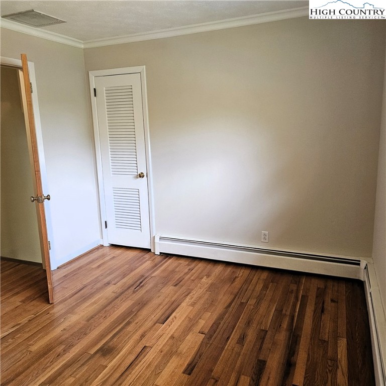 139 Charles Street Boone, NC 28607 - Photo 32 of 49 a view of an empty room and wooden floor