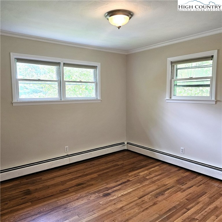 139 Charles Street Boone, NC 28607 - Photo 33 of 49 wooden floor in an empty room with a window