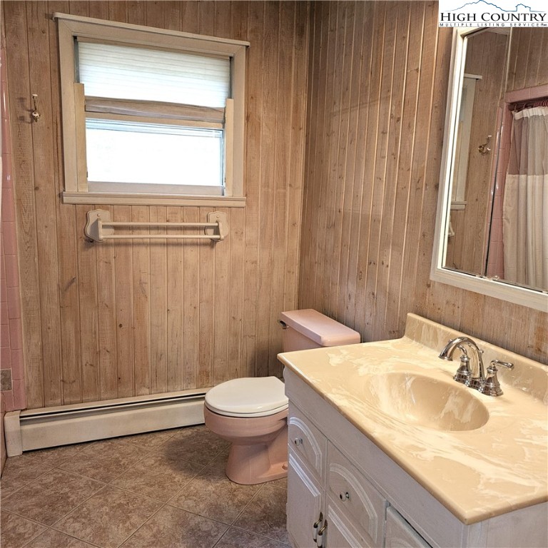 139 Charles Street Boone, NC 28607 - Photo 36 of 49 a bathroom with a sink a toilet and shower