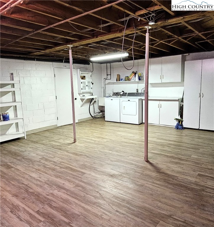 139 Charles Street Boone, NC 28607 - Photo 42 of 49 a view of a water heater room with wooden floor