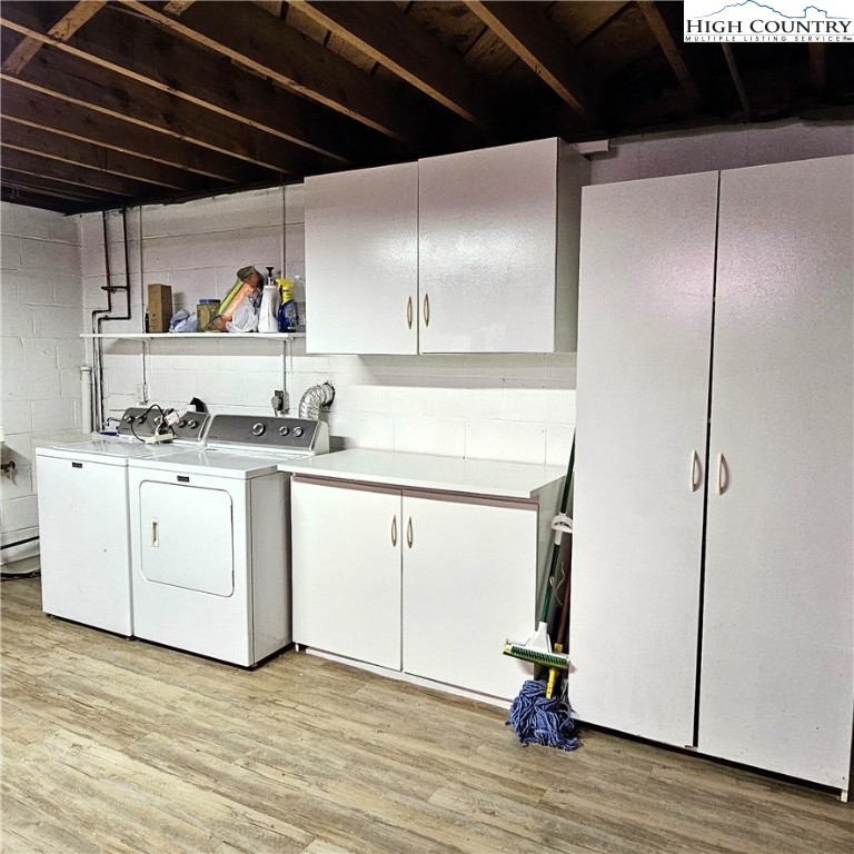 139 Charles Street Boone, NC 28607 - Photo 43 of 49 a kitchen with a sink cabinets and appliances