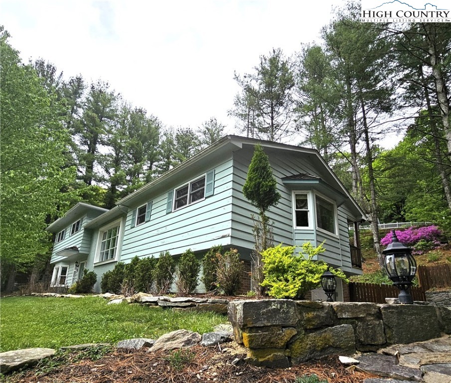 139 Charles Street Boone, NC 28607 - Photo 6 of 49 a front view of a house with a yard