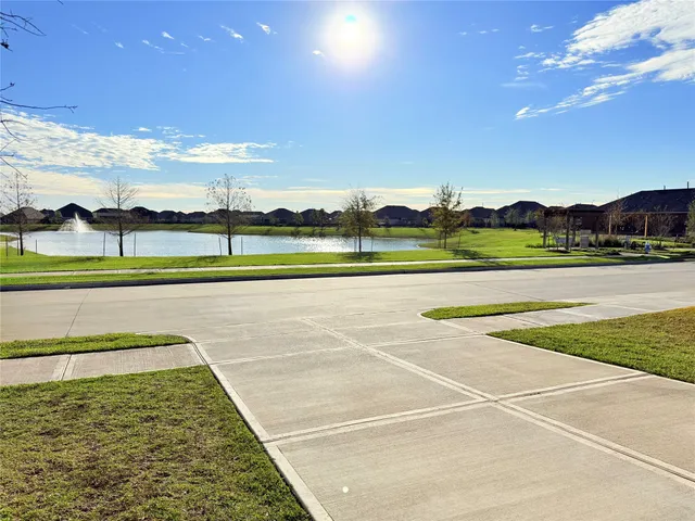 a view of an outdoor space and tennis court