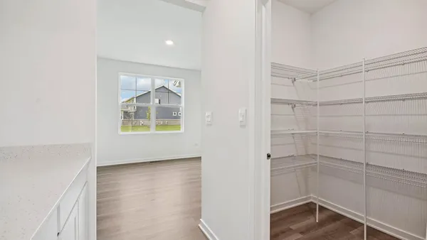 a view of empty room with closet