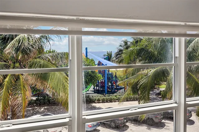 a view of a living room and a window