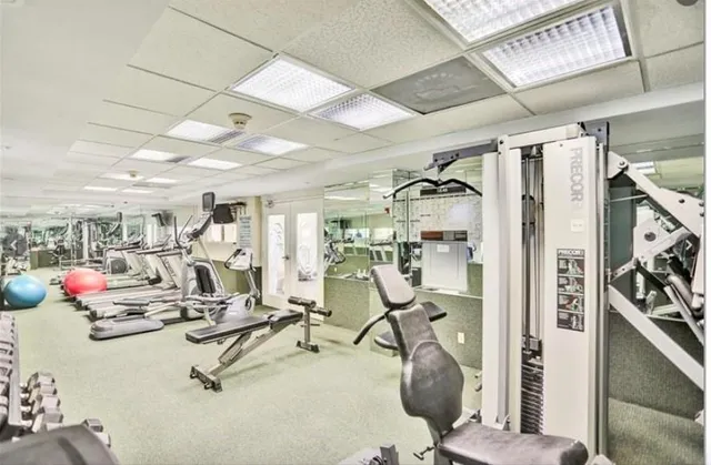 a view of a room with gym equipment