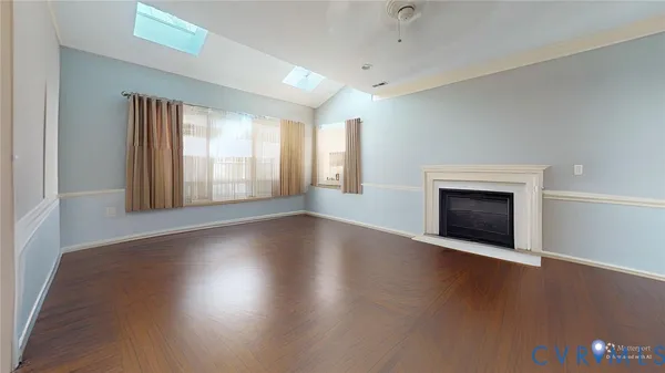 a bed room with furniture and a fireplace
