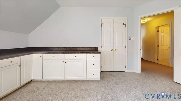a bedroom with bed and window