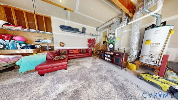 a view of a house with a big yard and large trees