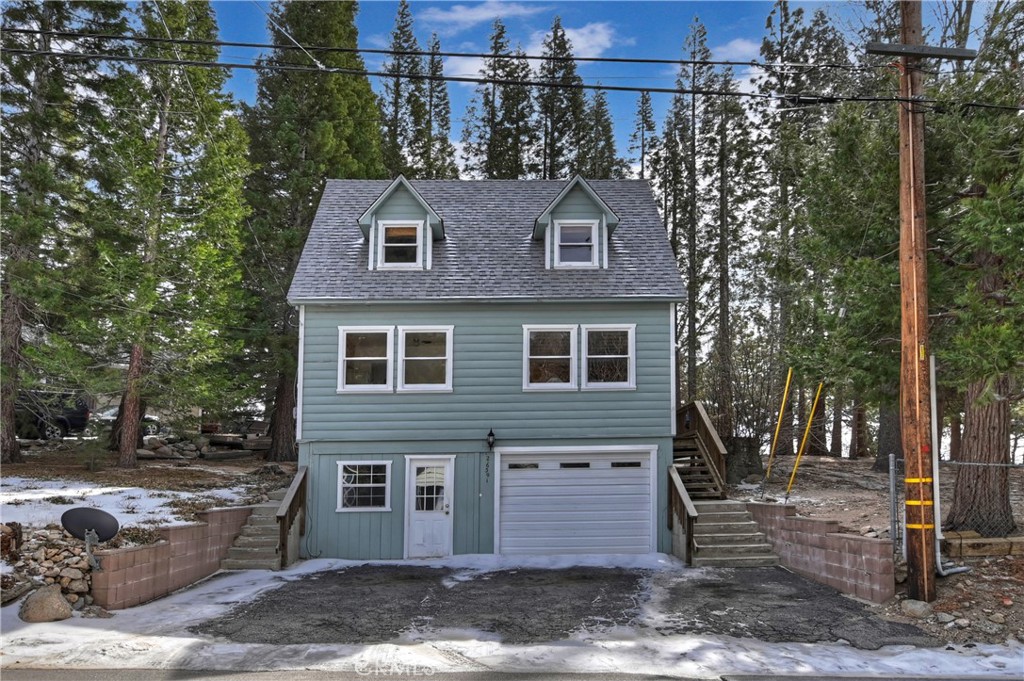 26391 Apache Trail Rimforest, CA 92378 - Photo 1 of 1 a view of a house with a yard