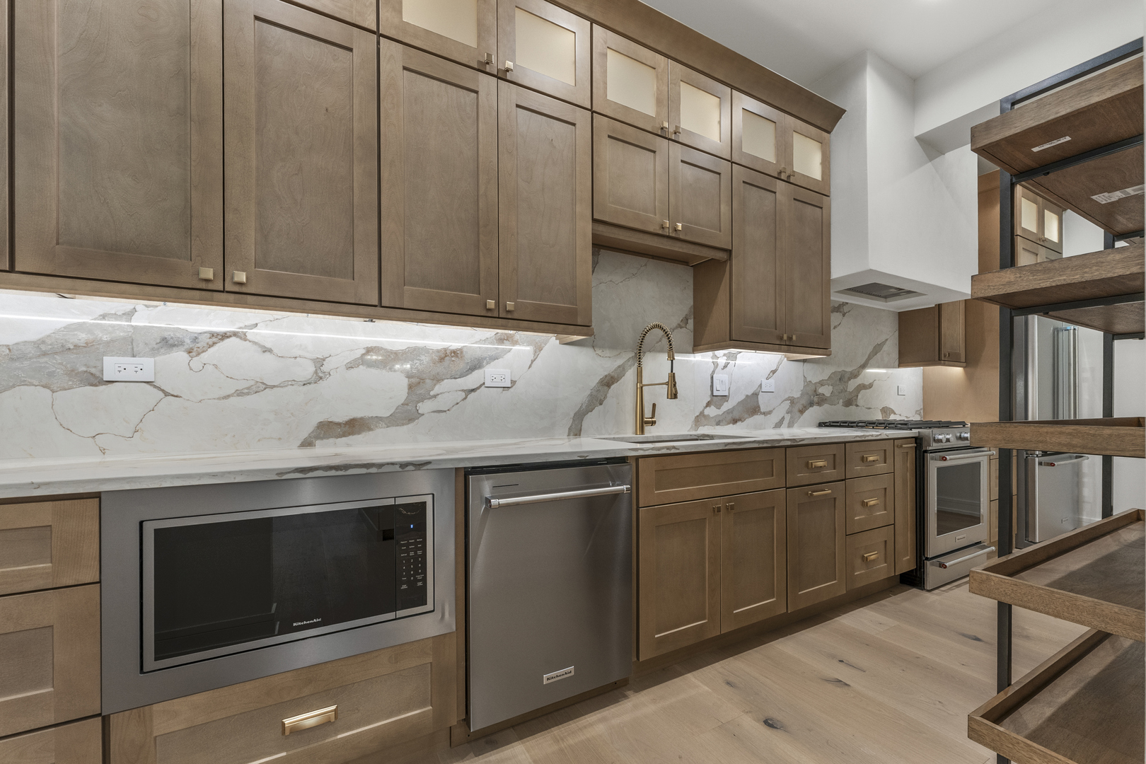 1504 Linden Circle Lemont, IL 60439 - Photo 13 of 54 a kitchen with granite countertop cabinets stainless steel appliances and wooden floor